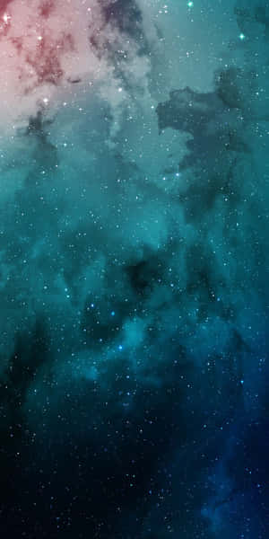 深邃太空中閃爍星星的鮮豔青色和粉紅色星雲。 — Pixel 3 壁紙