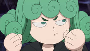 擁有綠色螺旋頭髮的動漫角色憤怒地握緊拳頭。 — 對馬戰鬼 GIF 壁紙