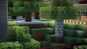 Minecraft遊戲場景，包含像素化的樹木和草地方塊，在日光下。 — 森林 壁紙