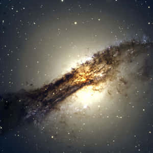 螺旋星系，帶有明亮核心和黑暗塵埃帶，以星空為背景。 — Astroworld GIF 壁紙