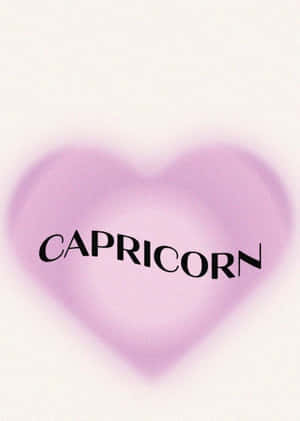 一個紫色心形，以黑色文字顯示Capricorn。 — 山羊座 GIF 壁紙