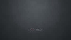 文字在深灰色紋理背景上顯示 I heart music。 — 音樂美學 壁紙