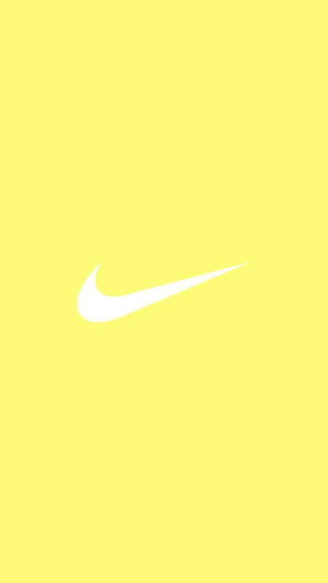黃色背景上的白色Nike勾號標誌 — 黃色美學 壁紙