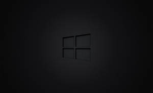 Windows標誌在帶有柔和照明的深色紋理表面上壓印。 — Cia標誌 壁紙
