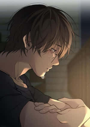 動漫男孩戴眼鏡在昏暗房間裡哭泣