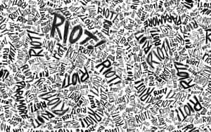 黑白混亂塗鴉文字牆紙，帶有像 riot 和 para more 這樣的詞語。 — 勵志語錄 壁紙