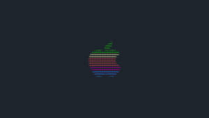 在深色背景上由彩色ASCII字符組成的發光Apple標誌。 — 鎖屏 壁紙