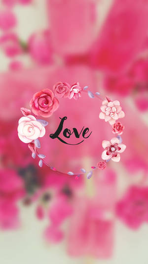 一個粉紅色的花環，中間有「Love」這個詞。 — 花卉動畫 壁紙