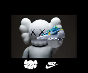 KAWS公仔拿著Nike波鞋，下方有標誌。 — 運動鞋 壁紙