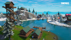 Fortnite冬季村莊，有木屋、碼頭和白雪覆蓋的樹木，旁邊是一條藍色河流。 — 要塞英雄 大逃殺 壁紙