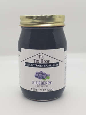 來自 The Tin Roof Country Store & Creamery 的藍莓果醬罐。 — 3:4 壁紙
