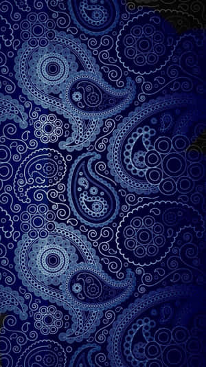 藍色佩斯利圖案，帶有旋轉的淚滴形狀和圓形圖案。 — 美學圖案 壁紙
