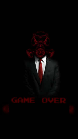 一個穿西裝的人戴著紅色防毒面具，並有紅色的「GAME OVER」文字。 — 最黑暗地牢 壁紙