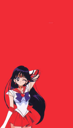 穿著水手服的動漫角色微笑著舉起一隻手。 — 美少女戰士 壁紙