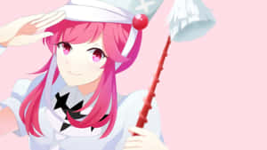 粉紅色頭髮動漫女孩拿著紅色魔杖敬禮。 — 粉紅動漫美學 壁紙