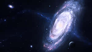 一個螺旋星系，帶有發光的旋臂和散落的星星，在深空中，附近有一顆小行星。 — 銀河系 壁紙