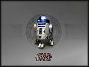 灰色背景上帶有星球大戰標誌的R2-D2機械人 — 機械人 壁紙