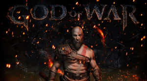 God of War 遊戲標題，戰士角色置身於火花之中。 — 戰士 壁紙
