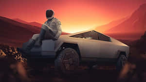 太空人在火星日落時坐在Cybertruck上 — 太空人 壁紙