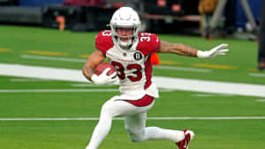 足球員在球場上帶球奔跑 — NFL 美式足球 GIF 壁紙