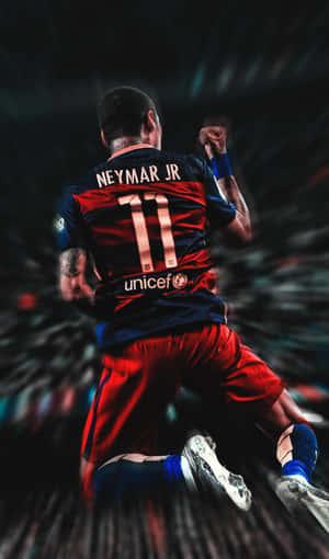 足球運動員尼馬（Neymar Jr.）在體育場高舉拳頭慶祝勝利。 — Galaxy Tab A 壁紙