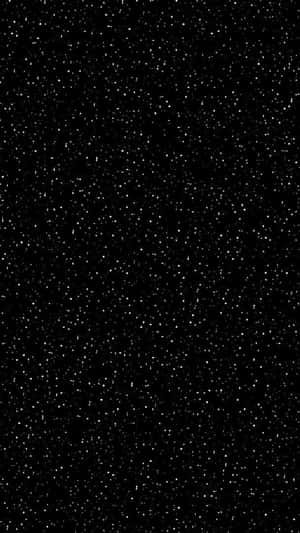 一個繁星點點的夜空，黑色背景上有無數細小的白色斑點。 — 銀河系 壁紙