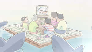 家人在被鯊魚包圍的浮動平台上觀看鯊魚電視節目。 — 夜神月 壁紙