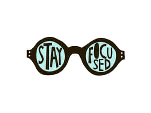 鏡片上帶有「STAY FOCUSED」文字的激勵眼鏡。 — 相機 壁紙