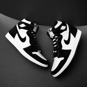 深灰色背景上的黑白Nike Air Jordan運動鞋。 — Jordan 標誌 GIF 壁紙