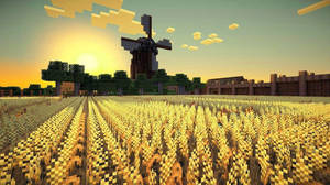 Minecraft風車在日落時分矗立在金色麥田和樹木之上。 — 雲朵 壁紙