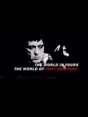東尼·蒙大拿肖像，附有文字「The World Is Yours」及「The World of Tony Montana」 — 疤面煞星 GIF 壁紙