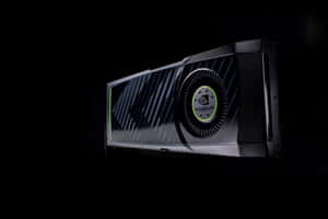 在黑暗環境中帶有發光綠色點綴的時尚黑色NVIDIA顯示卡。 — MacBook Air 13 壁紙