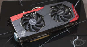 黑色大理石表面上的ASUS ROG Strix顯示卡 — 4K 遊戲 壁紙
