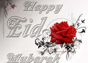 Happy Eid Mubarak 祝福，配有紅玫瑰和裝飾性漩渦。 — 低飽和度 壁紙