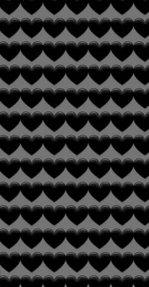 灰色背景上重複光滑黑色心形的牆紙 — Pixel Fold 壁紙