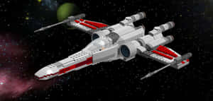 LEGO X-wing 戰機在綠色行星和彩色星雲附近飛越太空。 — 銀河狼 壁紙