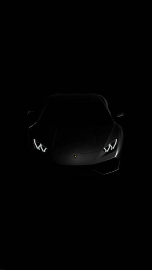 黑暗中車頭燈發光的黑色林寶堅尼跑車。 — 暗色 壁紙