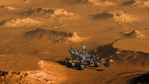 探測車在橙色天空下探索岩石火星地形 — 火星 GIF 壁紙