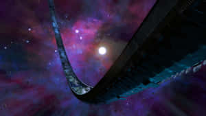 未來風格的橋樑橫跨色彩繽紛的星雲，帶有一顆明亮的星星。 — Astroworld GIF 壁紙