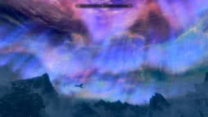 一條龍在色彩繽紛的星雲天空下飛越雪山。 — 風景動圖 壁紙