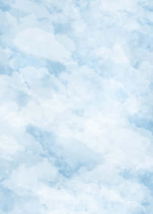 淡藍色天空中漂浮的柔和水彩雲