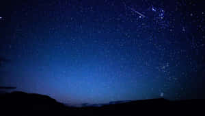 一片有幾粒流星嘅星空