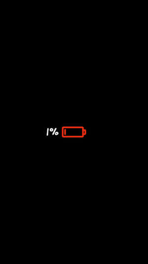 黑色背景上顯示1%的紅色低電量圖標。 — 極簡美學 壁紙