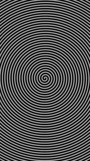 黑色和灰色同心圓形成催眠螺旋圖案。