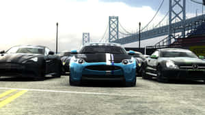 一群汽車停泊在橋前 — Grid Autosport 壁紙