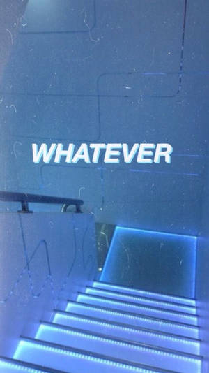 藍色燈光樓梯向上，牆上有「WHATEVER」文字。