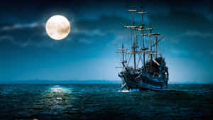 海盜船在滿月下航行於夜間深色海洋 — 月色夜空 壁紙