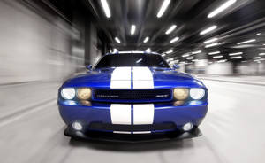 藍色肌肉車在隧道中疾馳，帶有動態模糊效果。 — Dodge challenger GIF 壁紙