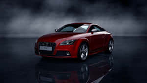 紅色 Audi TTS 跑車在反光地板上，背景有煙霧。 — 奧迪 GIF 壁紙