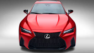 紅色Lexus跑車的前視圖，帶有黑色格柵和銳利頭燈。 — 汽車 壁紙